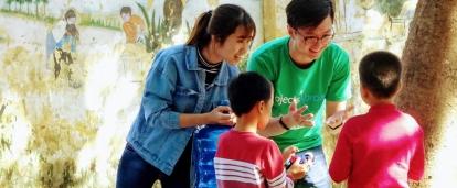 Childcare volunteers teach local children in Vietnam about proper hand washing. Children are taught about hygiene and washing hands by Projects Abroad volunteers at a care centre in Vietnam.
